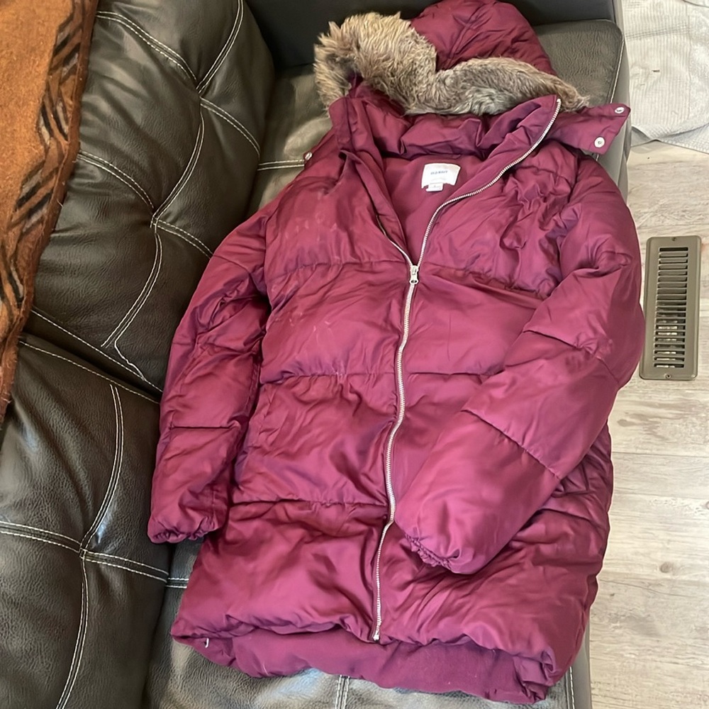 Old navy puffy winter jacket. Small group of water spots on right side of coat